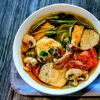 Rice noodle tomato soup (canh bun) with vegan ham and water spinach at Saigon Vegan in Garden Grove, CA
