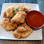 Crispy battered soft tofu pieces with plum sauce at Saigon Vegan in Garden Grove, CA