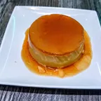 Slice of silky vegan coconut caramel flan at Saigon Vegan in Garden Grove, CA